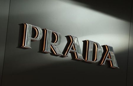 © Reuters. Sunlight is reflected on a Prada logo outside its store at Hong Kong's shopping Tsim Sha Tsui district