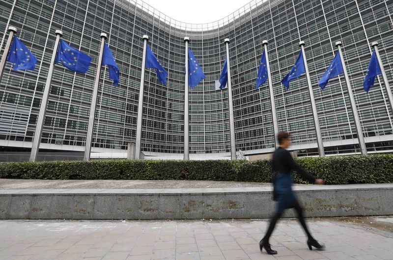 &copy; Reuters A woman walks past the European Commission headquarters in Brussels