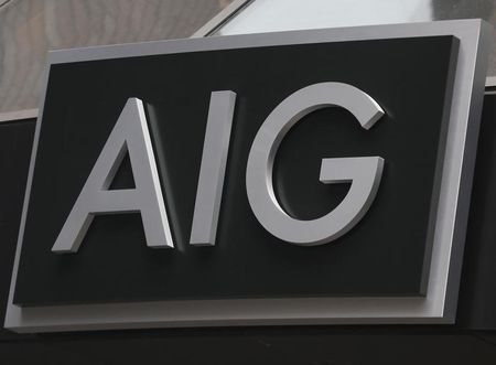 © Reuters. A new sign is displayed over the entrance to the AIG headquarters offices in New York's financial district