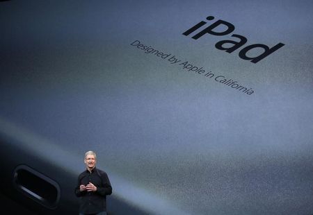 © Reuters. Apple Inc CEO Tim Cook speaks about the new iPad Air during an Apple event in San Francisco