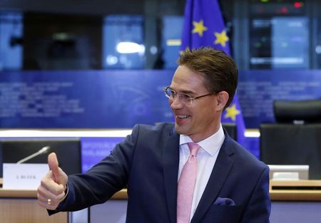 © Reuters. European Jobs, Growth, Investment and Competitiveness Commissioner-designate Katainen gestures before addressing the European Committee on Economic and Monetary Affairs at the EU Parliament in Brussels