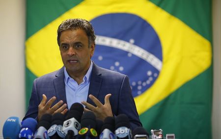 © Reuters. Brazil's Social Democratic Party presidential candidate Neves attends a news conference in Rio de Janeiro
