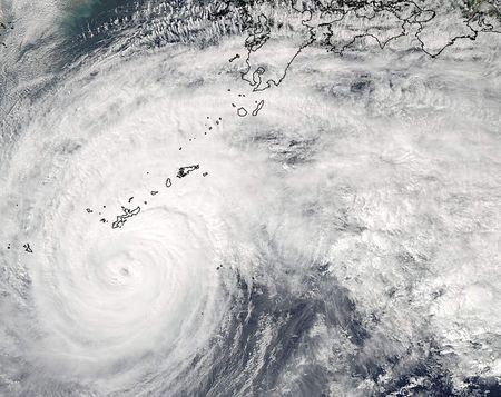 © Reuters. Handout photo shows a MODIS image from NASA's Aqua satellite shows Typhoon Vongfong in the Pacific Ocean, approaching Japan's main islands on its northward journey