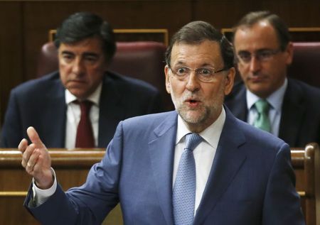 © Reuters. Spanish PM Rajoy answers a question during the weekly control session at parliament in Madrid