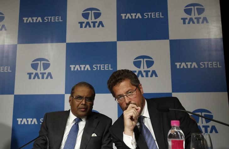 &copy; Reuters Tata Steel's Managing Director Hemant Nerurkar and Tata Steel Europe's Managing Director Karl-Ulrich Koehler speak to each other before a news conference to announce their fourth quarter results in Mumbai