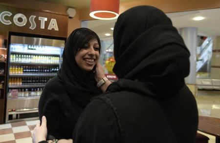 © Reuters. Bahraini activist al-Khawaja is greeted by Sumaiya, wife of jailed activist Nabeel Rajab, after her release from prison in Budaiya, west of Manama