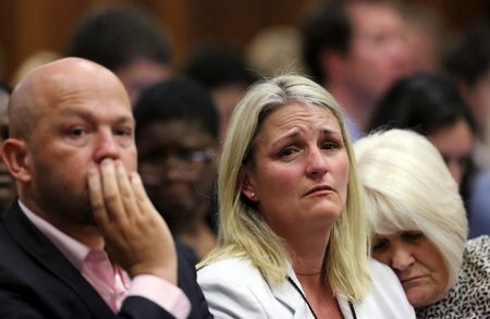 © Reuters. The family members of Steenkamp react as the verdict is handed down to Olympic and Paralympic track star Pistorius at the North Gauteng High Court in Pretoria