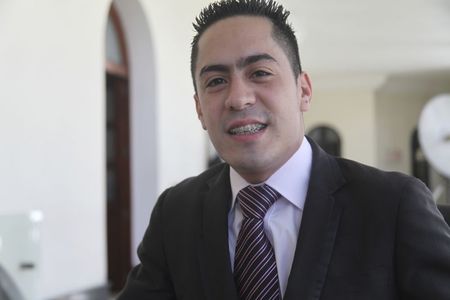 © Reuters. A handout file photo of slain lawmaker Robert Serra speaking to media in Caracas