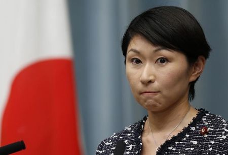 © Reuters. Japan's new Economy, Trade and Industry Minister Obuchi attends a news conference at Prime Minister Shinzo Abe's official residence in Tokyo