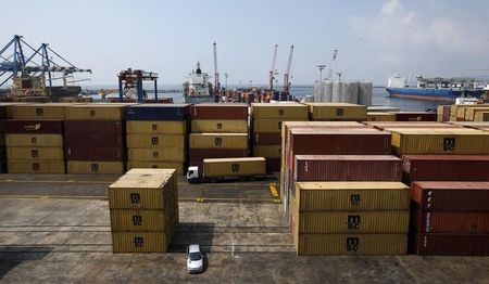 © Reuters. Containers are seen at Naples harbour