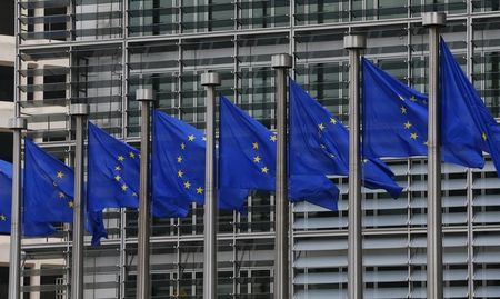 © Reuters. European flags are seen outside the European Commission headquarters in Brussels