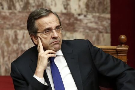 © Reuters. Greece's Prime Minister Samaras attends a parliament session before a confidence vote for the country's coalition government in Athens