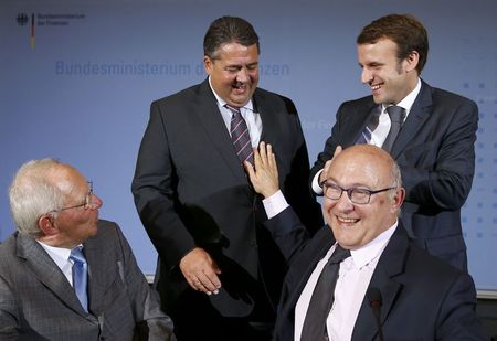 © Reuters. German and French Finance ministers Schaeuble and Sapin and German and French Economy ministers Gabriel and Macron meet in Berlin