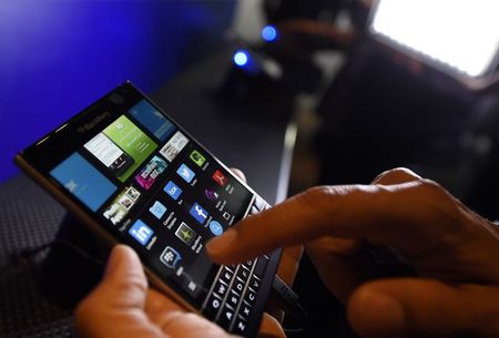 © Reuters. A BlackBerry Passport smartphone is shown at its official launching event in Toronto