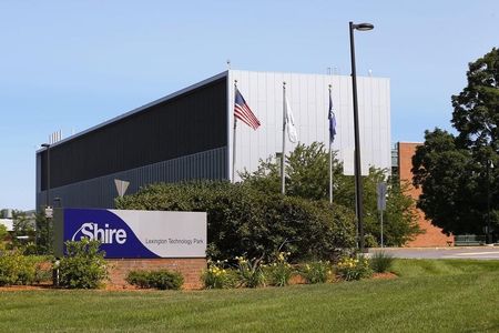 © Reuters. A sign sits in front of Shire's manufacturing facility in Lexington, Massachusetts