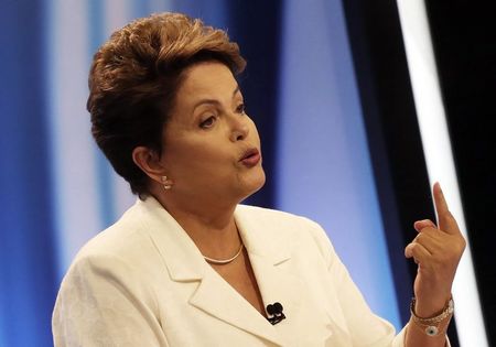 © Reuters. Brazil's President and Workers' Party (PT) presidential candidate Rousseff takes part in a TV debate in Sao Paulo