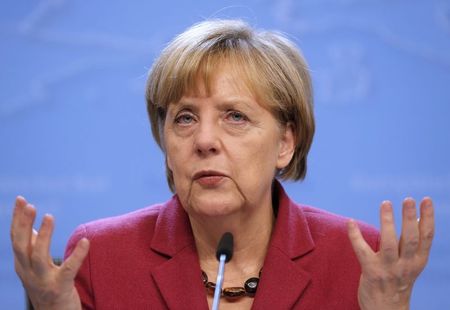 © Reuters. Germany's Chancellor Angela Merkel addresses a news conference during an EU summit in Brussels