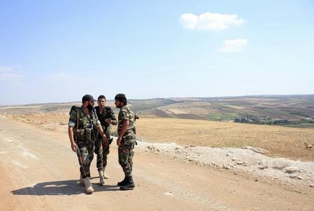 © Reuters. التلفزيون السوري: الجيش يحكم سيطرته على بلدة مورك بغرب سوريا