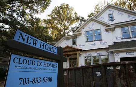 © Reuters. A real estate sign advertising a new home is pictured in Vienna, Virginia