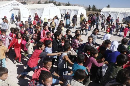 © Reuters. المساعدات النقدية للاجئين تنجح رغم شكوك المانحين