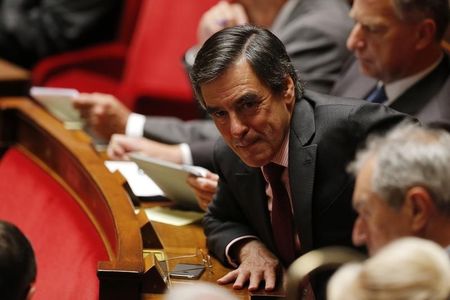 © Reuters. Francois Fillon, former French prime minister and current centre-right UMP political party deputy, attends the questions to the government session at the National Assembly in Paris