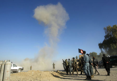 © Reuters. Smoke rises in the sky after Afghan security forces defused an explosive device at the site of a blast in Jalalabad city