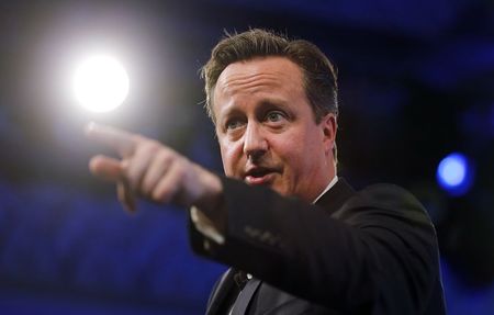 © Reuters. Britain's Prime Minister David Cameron points as he speaks at the Confederation of British Industry annual conference in London