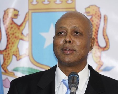 © Reuters. Somalia's new PM Ahmed delivers his speech at the Parliament Building in Mogadishu