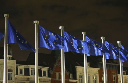 © Reuters. European Union flags fly outside the European Commission headquarters in Brussels