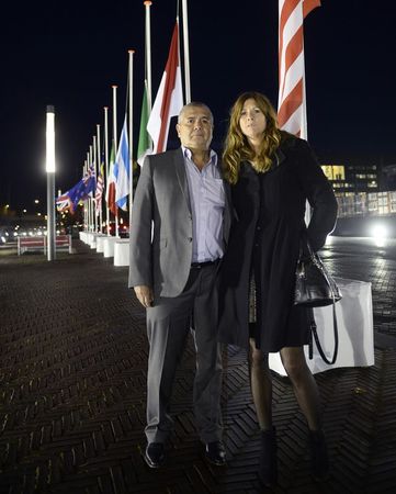 © Reuters. Silene and Rob Fredriksz, parents of a victim in the crash of the Malaysian Airlines MH17, pose for Reuters after a national memorial at the RAI convention center in Amsterdam