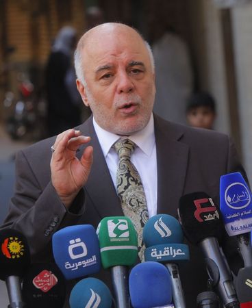 © Reuters. رئيس الوزراء العراقي يقيل 26 من قادة الجيش بسبب عدم الكفاءة والفساد