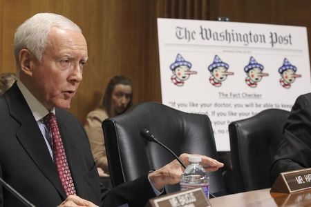 © Reuters. U.S. Senator Hatch questions HHS Secretary Sebelius during Senate Finance Committee hearing about "Obamacare" on Capitol Hill in Washington