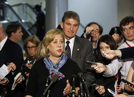 © Reuters. Senator Landrieu holds a news conference with fellow committee member Senator Manchin on Keystone XL pipeline in Washington