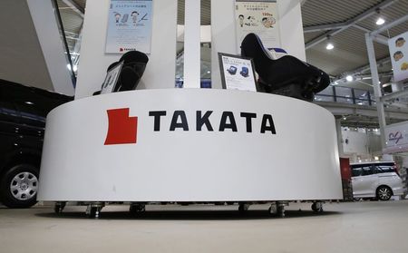 © Reuters. Displays of Takata Corp are pictured at a showroom for vehicles in Tokyo