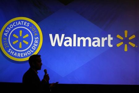 © Reuters. File photo of Senior vice-president for mobile and digital Walmart Global eCommerce answering a question at a Walmart media presentation in Rogers