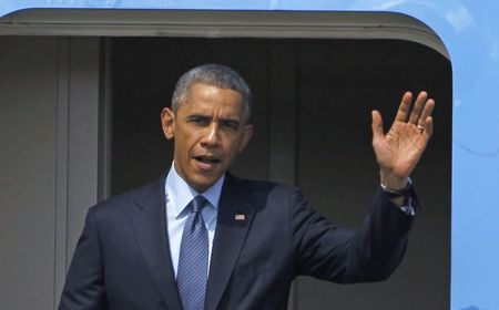 © Reuters. Obama arrives in Yangon airport