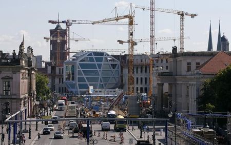 © Reuters. A general view shows the old city skyline at Unter den Linden street with the construction site of the Berliner Schloss - Humboldtforum in Berlin