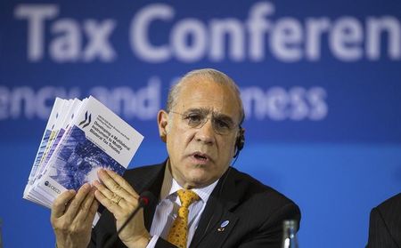 © Reuters. Secretary-General of the OECD Angel Gurria addresses a news conference in Berlin