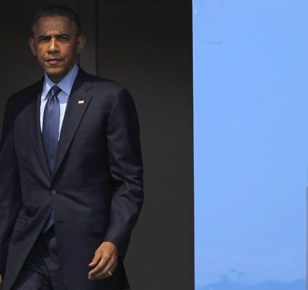 © Reuters. Obama arrives in Yangon airport