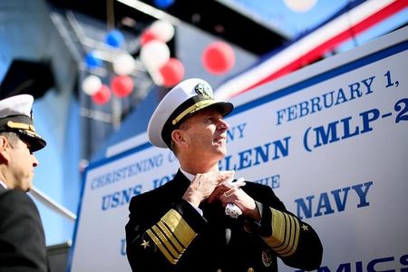 © Reuters. Admiral Jonathan Greenert, Chief of Naval Operations, speaks with reporters during the christening ceremony for the USNS John Glenn at the General Dynamics NASSCO Shipyard in San Diego