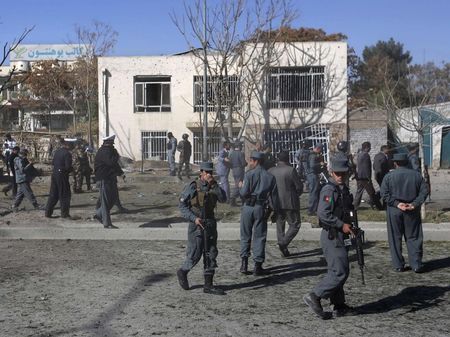 © Reuters. Afghan police stand at the site of a blast in Kabul