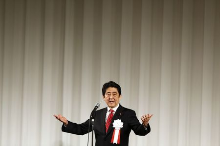 © Reuters. Japan's Prime Minister Abe delivers speech during ceremony marking 50th anniversary of the founding of Komeito Party in Tokyo