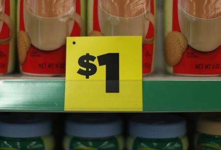 © Reuters. A price sign is displayed at a Dollar General store in Arvada