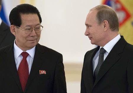 © Reuters. Russian President Vladimir Putin and new North Korea's Ambassador Kim Hyun-joon attend a ceremony to hand over credentials at the Kremlin in Moscow