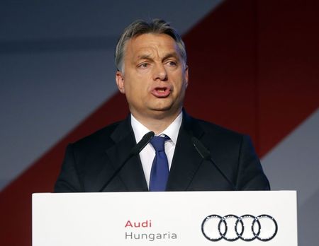 © Reuters. Hungarian Prime Minister Viktor Orban delivers a speech during a ceremony for the start of the serial production of the new Audi TT roadster at the Audi plant in Gyor