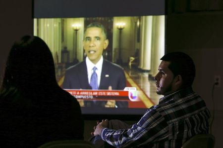 © Reuters. BARACK OBAMA ANNONCE LA RÉGULARISATION DE 4,7 MILLIONS DE SANS-PAPIERS