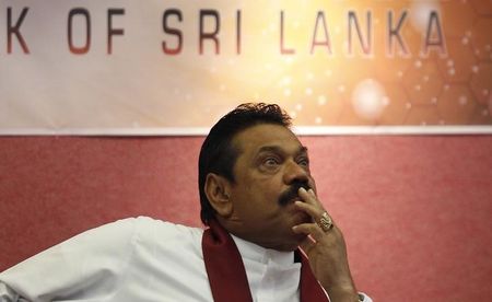 © Reuters. Sri Lanka's President Rajapaksa looks on during the presentation of the 2012 Central Bank of Sri Lanka annual report, in Colombo
