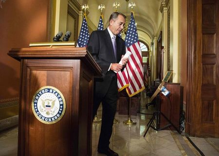 © Reuters. Speaker of the House John Boehner (R-OH) walks from the lectern after denouncing the executive order on immigration made by U.S. President Barack Obama