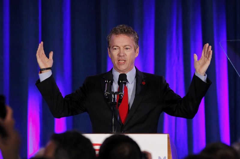 © Reuters. Senator Rand Paul addresses the crowd at U.S. Senate Minority Leader Mitch McConnell's midterm election night rally in Louisville