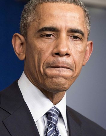 © Reuters. اوباما يحث ابناء فيرجسون على قبول قرار هيئة المحلفين بشان واقعة وفاة براون